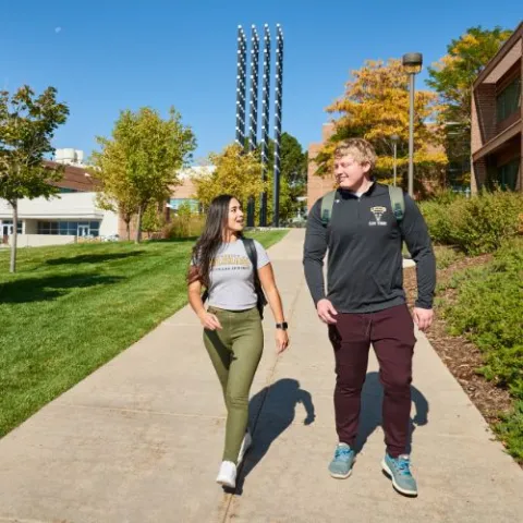 students walking on campus